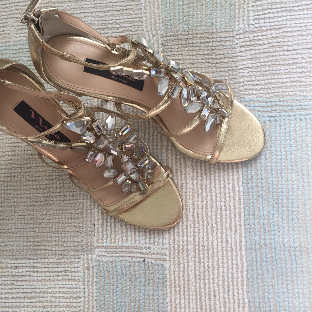 NINA gold heels with rhinestones.
